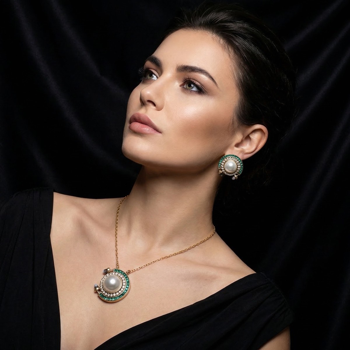 Pearl and emerald jewelry editorial portrait