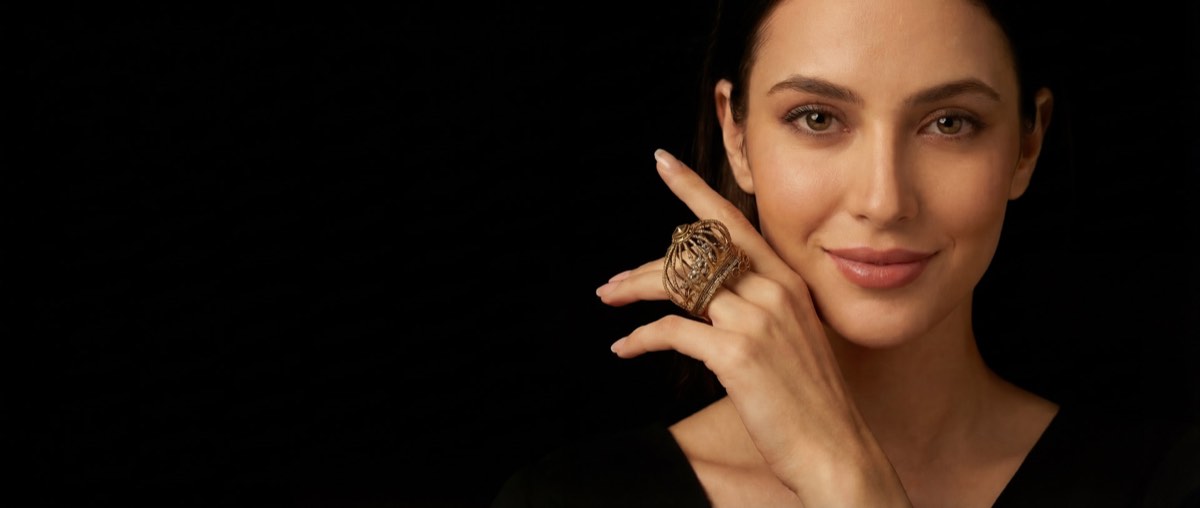 Gold filigree ring close-up editorial